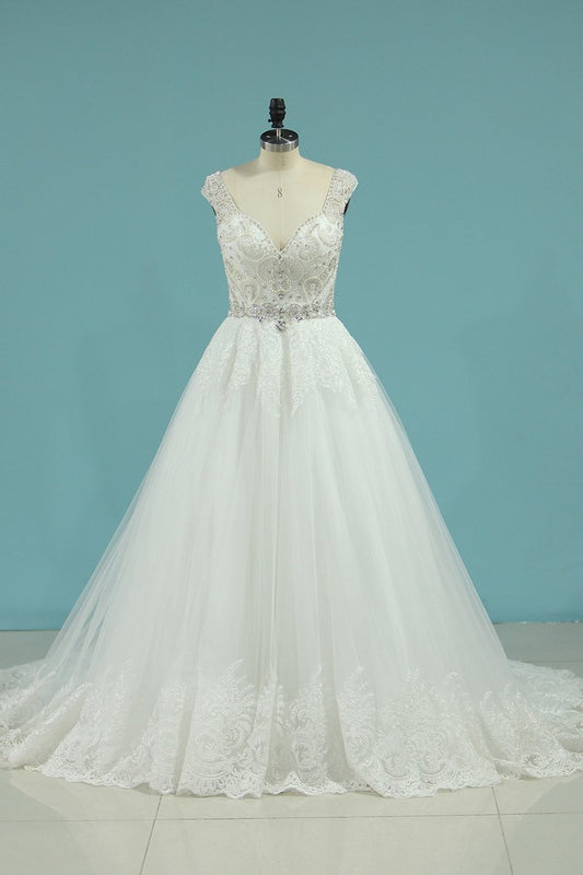 2022 A Line Open Back V Neck Wedding Dresses Tulle With Applique And Beading Chapel Train
