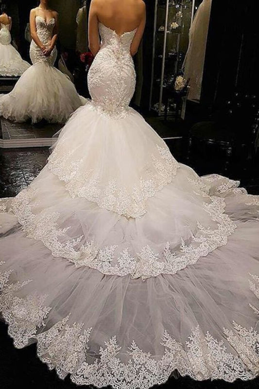 2024 Mermaid/Trumpet Sweetheart Tulle Wedding Dresses With Appliques