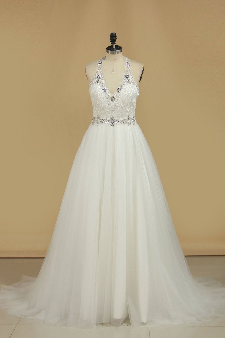 2024 Halter Wedding Dresses A Line Open Back Tulle With Emroidery And Beads