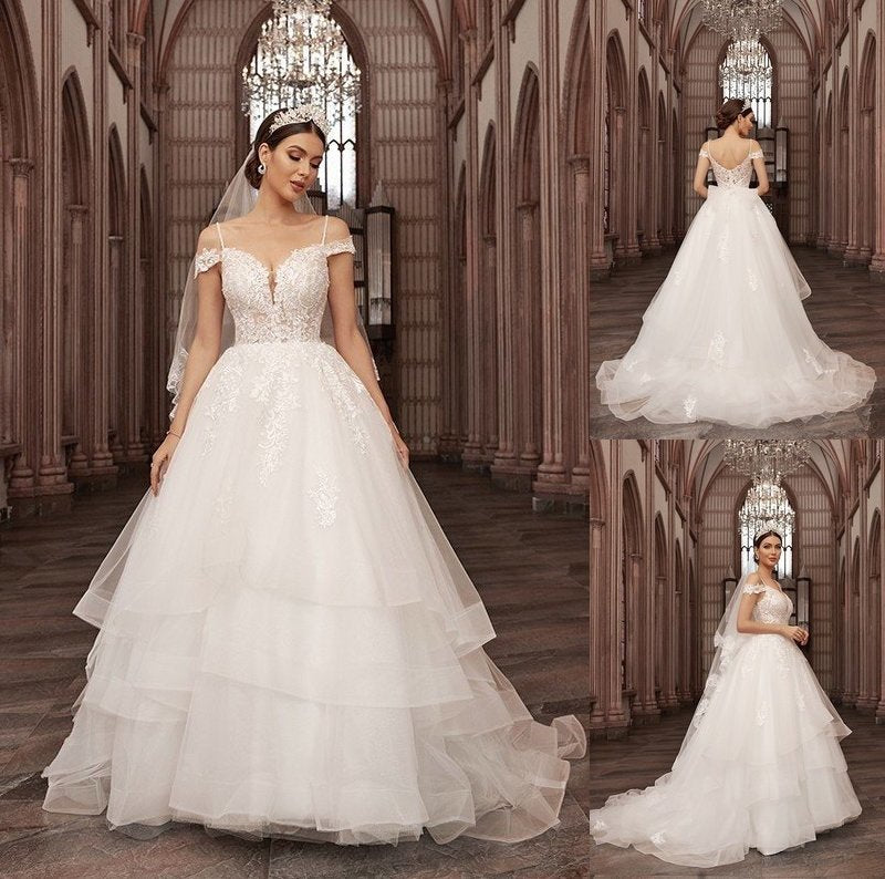 Tulle Sweetheart Applique Sleeveless A-Line/Princess Sweep/Brush Train Wedding Dresses