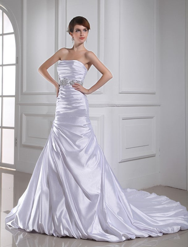 Trumpet/Mermaid Sleeveless Applique Strapless Beading Elastic Woven Satin Wedding Dresses