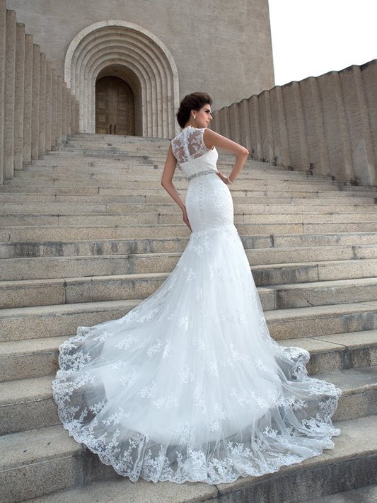 Long Trumpet/Mermaid Sleeveless V-neck Applique Lace Wedding Dresses