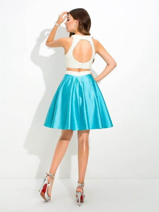 A-Line/Princess Short Sleeveless Jersey Beading Satin Two Piece Dresses