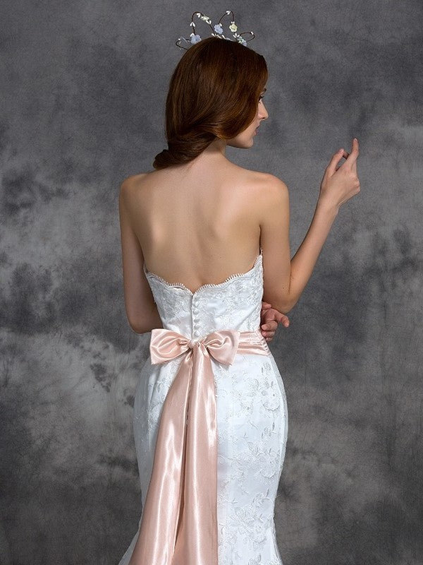 Trumpet/Mermaid Sleeveless Sash/Ribbon/Belt Strapless Long Lace Wedding Dresses